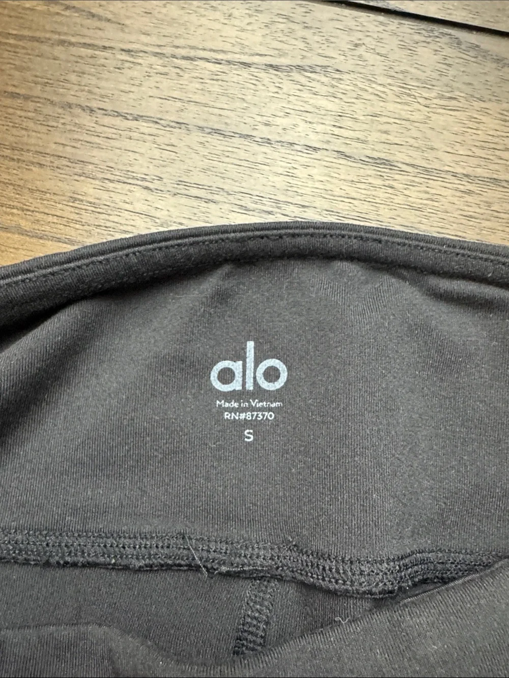 ALO Yoga Black Leggings with Subtle Reflective Accents